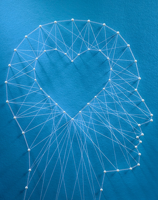 Abstrakt bild av ett huvud i profil, med hjärta i stället för hjärna